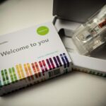 This illustration picture shows a saliva collection kit for DNA testing displayed in Washington DC