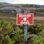 A sign warns people of landmines.