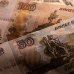 A economia da Rússia enfrenta a viagem de ameaça