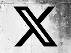 X começa a implementar o recurso ‘Sobre esta conta’ nos perfis dos usuários X (formerly Twitter) logo on a cracked wall