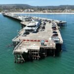 Os visitantes estão em uma doca em Santa Cruz Wharf, em Santa Cruz, Califórnia, na quarta -feira, 21 de maio de 2025 (NHAT V. Meyer/Bay Area News Group)