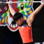 Jay-R Colonia competindo nos 49 kg dos jovens, o Campeonato Mundial Juvenil e Júnior da IWF.