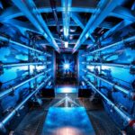 A light shines on laser preamplifiers at the National Ignition Facility.