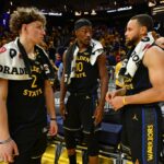 Stephen Curry (30), dos Golden State Warriors, conversa com seu filho Canon após o jogo 6 do jogo dos playoffs da NBA da Conferência Oeste da primeira rodada no Chase Center em San Francisco, Califórnia, na sexta-feira, 2 de maio de 2025. O Houston Rockets derrotou o Golden State Warriors 115-107. (Jose Carlos Fajardo/Bay Area News Group)
