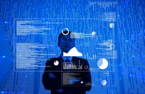 Mais de 250 CEOs apóiam a educação da AI e a ciência da computação da AI através de uma carta aberta assinada por mais de 250 executivos Man standing in front of big blue screen with charts and data spread out before him.