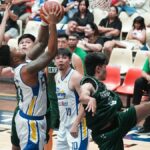 Jameslaput da Magnolia (centro) vence nesse jogo de rebote apertado. —AGUTA DELA CRUZ
