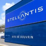 sign at the entrance of the plant of Dutch multinational automotive manufacturing company Stellantis