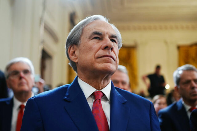 Greg Abbott, governor of Texas, as US President Donald Trump, not pictured, speaks before an executive order signing in the East Room of the White House in Washington, DC, US, on Thursday, March 20, 2025. The order directs the secretary of education to take steps to close the department and "return education authority to the States," according to a White House fact sheet on the order. Photographer: Bonnie Cash/UPI/Bloomberg via Getty Images