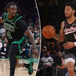Jrue Holiday #4 Boston Celtics dribla a bola.