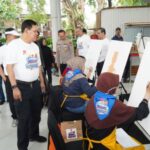 Centenas de crianças e deficiências participaram do 79º dia de Bhayangkara através da competição de colorir Heller