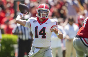 “Crazy Sh*t nos playoffs”: as chances do analista da CFB Georgia de ganhar Natty com o artilheiro Stockton March Madness Logo