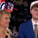 Liam Mcney em lágrimas com a mãe Ashley no momento emocional do draft de 2025 da NBA
