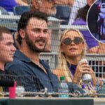 Paul Skenes e Livvy Dunne assistem a uma partida de beisebol.