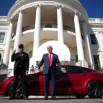 U.S. President Donald Trump and White House Senior Advisor, Tesla and SpaceX CEO Elon Musk deliver remarks next to a Tesla Model S on the South Lawn of the White House on March 11, 2025 in Washington, DC.