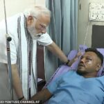 O britânico Vishwash Kumar Ramesh, 40 anos, sobreviveu milagrosamente ao planejar anastrófico. Imagem: Primeiro Ministro Narendra Modi (L) Reunião com Vishwash Kumar Ramesh em um hospital de Ahmedabad na sexta -feira