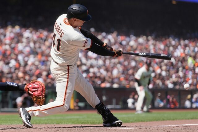 Os gigantes do SF recebem uma vitória Logan Webb, evite varrer graças ao duplo da embreagem de Wilmer Flores.

