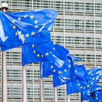 European Union flags flutter in the wind