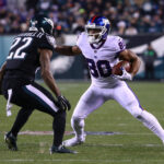 Otimista do campeão do Super Bowl em um Rakroud de NY Giants