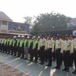 Quando o segurança ingressou na competição da ONU para os exercícios de pau na delegacia regional de Priok, que comemora o 79º Bhayangkara Hari