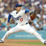 Três faixas da parte de trás de Shoei Ohtani na montanha