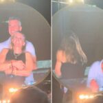 O par mostrado na tela grande no concerto do Coldplay.