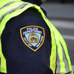 A chamada de Nova York desapareceu a presença da polícia, veículos de emergência