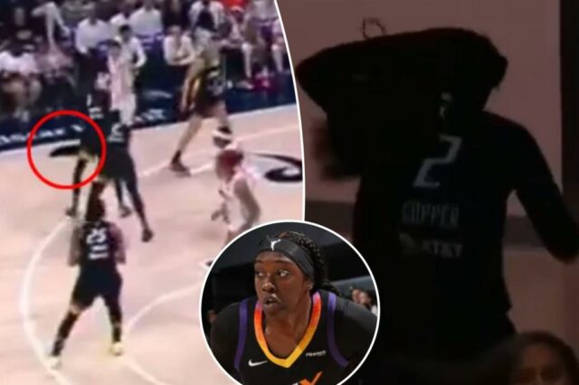 A estrela da WNBA Kahleah Copper's Parga cai do meio do jogo-o fã é jogado atrás da zombaria

