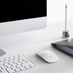 As oito razões pelas quais as pessoas atualizam Mac ou PC, à medida que as remessas aumentam | MacBook e iMac em uma mesa
