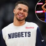 Michael Porter Jr. sorrindo na camisa Denver Nuggets.