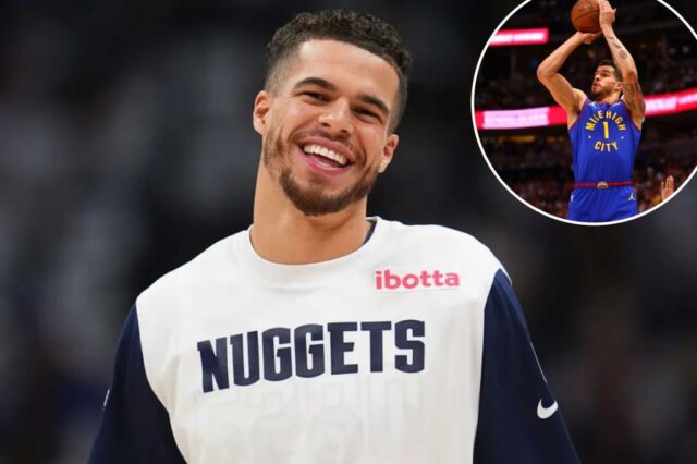 Michael Porter Jr. sorrindo na camisa Denver Nuggets.