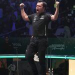 Carlo Biado comemora à mesa após sua última obra -prima. -Matchroompool Photo
