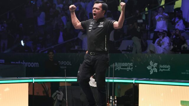 Carlo Biado comemora à mesa após sua última obra -prima. -Matchroompool Photo