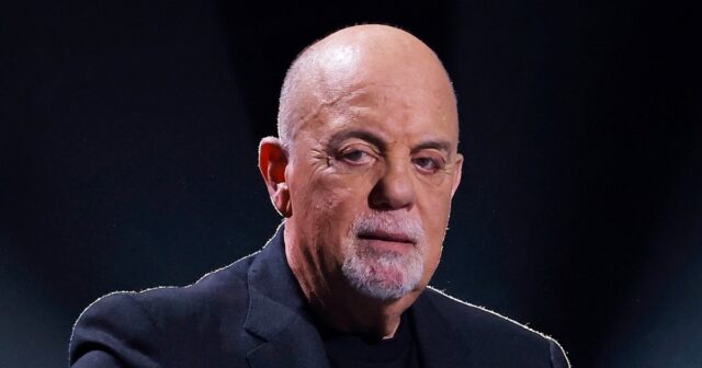 Cantor Billy Joel e baterista Jon Small of the Rock Band 