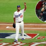 A Liga Nacional do arremessador Clayton Kershaw (22), de Los Angeles Dodgers, deixa o jogo durante a primeira rodada durante o jogo em 2025 MLB All Star em Truist Park.