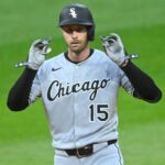 Com o juiz, o Yankees Slater Trade