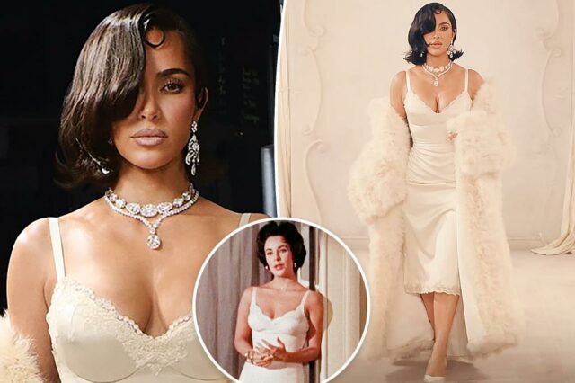 Kim Kardashian vai ao longo da pista até Balenciaga, usando quase US $ 400.000 em brincos de Elizabeth Taylor

