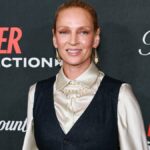 Mente Thurman como Ellen Claremont em vermelho branco e azul real