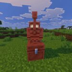 Você precisará de um bloco de cobre e uma abóbora esculpida para revelar um Goem de cobre e um baú (imagem via Sportskea Gaming || Mojang Studios)