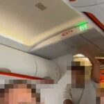 Momento assustador EasyJet passageiro grita "Eu tenho uma bomba" em voo lotado antes que o herói o agite