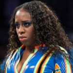 Naomi está sofrendo outra perda para seu velho amigo e companheiro de equipe na WWE Evolution
