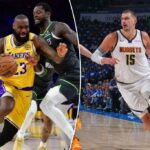 O Los Angeles Lakers LeBron James (23) o atacante se move para a cesta contra o Minnesota Timberwolves, para Julius Randle (30) durante a primeira metade da quinta rodada nos playoffs da NBA em 2025 na Crypto.com Arena.