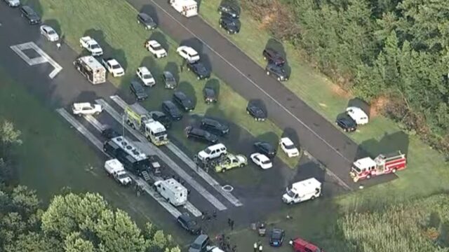 Uma verta de 15 pessoas no final da pista