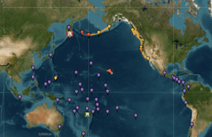 O mapa de aviso do tsunami mostra áreas em ameaças O mapa de aviso do tsunami mostra áreas em ameaças