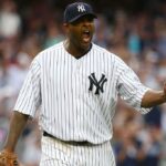 CC Sabathia #52 O New York Yankees fornece o arremesso na primeira rodada contra o Boston Red Sox em 23 de agosto de 2009 no Fenway Park, Boston, Massachusetts.
