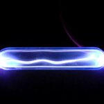 Electricity lights up krypton gas, showing a plasma discharge.