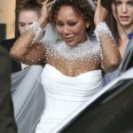 Mel B foi o símbolo de uma linda noiva vermelha para o casamento de Rory McPhee na Catedral de São Paulo no sábado