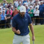 Scottie Scheffler reage depois de estabelecer seis vegetação durante a última rodada do British Open em 20 de julho de 2025.