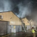 Fire at the warehouse in Leyton was carried out by the gang and destroyed more than £100,000 of kit