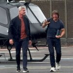 Tom Cruise parecia estar nos espíritos de Joviala quando desembarcou em Londres em seu helicóptero na sexta -feira (ele é retratado com David Coulthard)