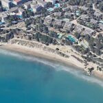 As autoridades compartilharam uma vista de voo da praia em Tarragona